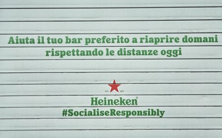 Il messaggio di Heineken Italia colora le saracinesche dei locali di Milano